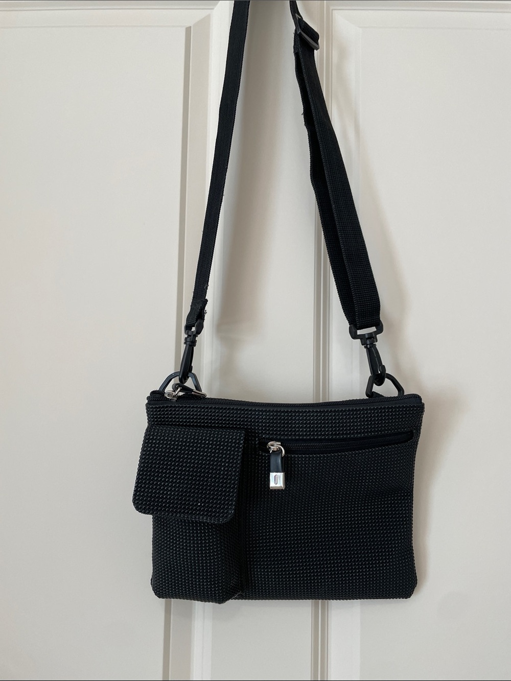 Urban Oxide Black Crossbody Shoulder Bag with Front and back pocket. Rubberized